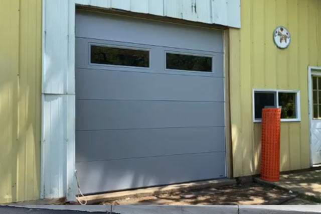 exterior of a commercial garage door at an industrial park