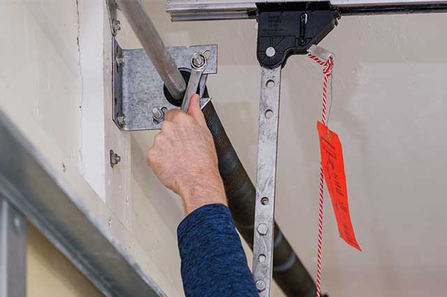spring-repair3 repairing a broken grage door spring